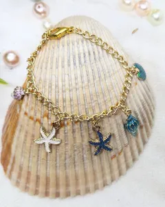 Gold Tone Beach Charm Bracelet – 8 Inch – Lobster Clasp