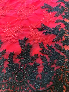 Red chiffon sari with red and black applique embroidery for sale