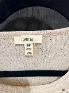 Casual white top for sale.
